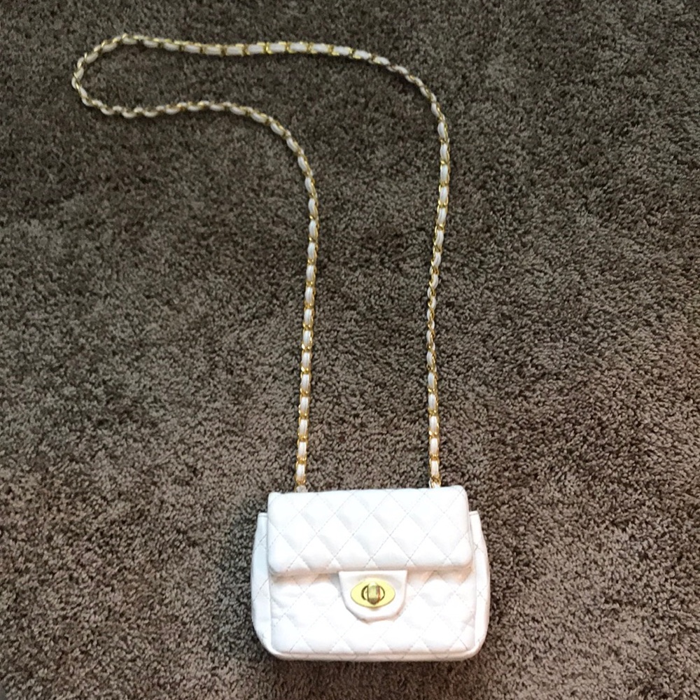 White quilted crossbody bag with gold detailing